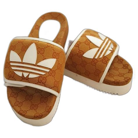 adidas gucci monogram slide mesa.